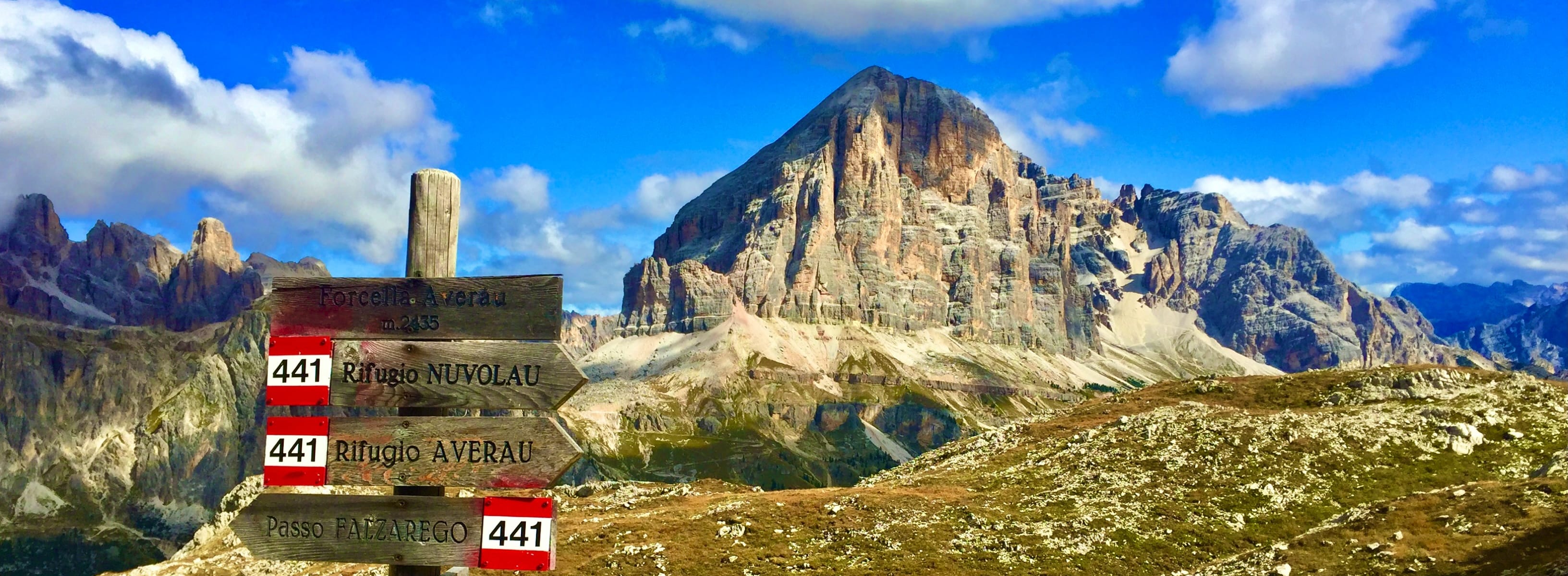 Sign pointing to rifugio Averau on our guided Dolomites Alta Via 1 tour Sign pointing to rifugio Averau on our guided Dolomites Alta Via 1 tour