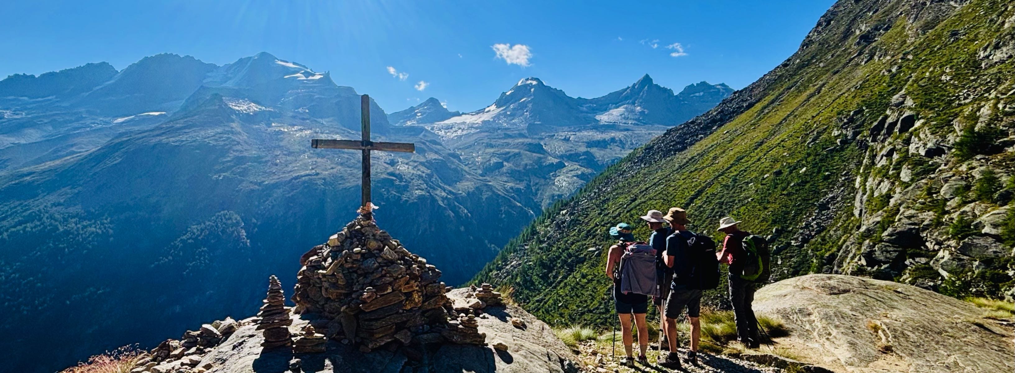Self-guided hikers looking towards Gran Paradiso Self-guided hikers looking towards Gran Paradiso