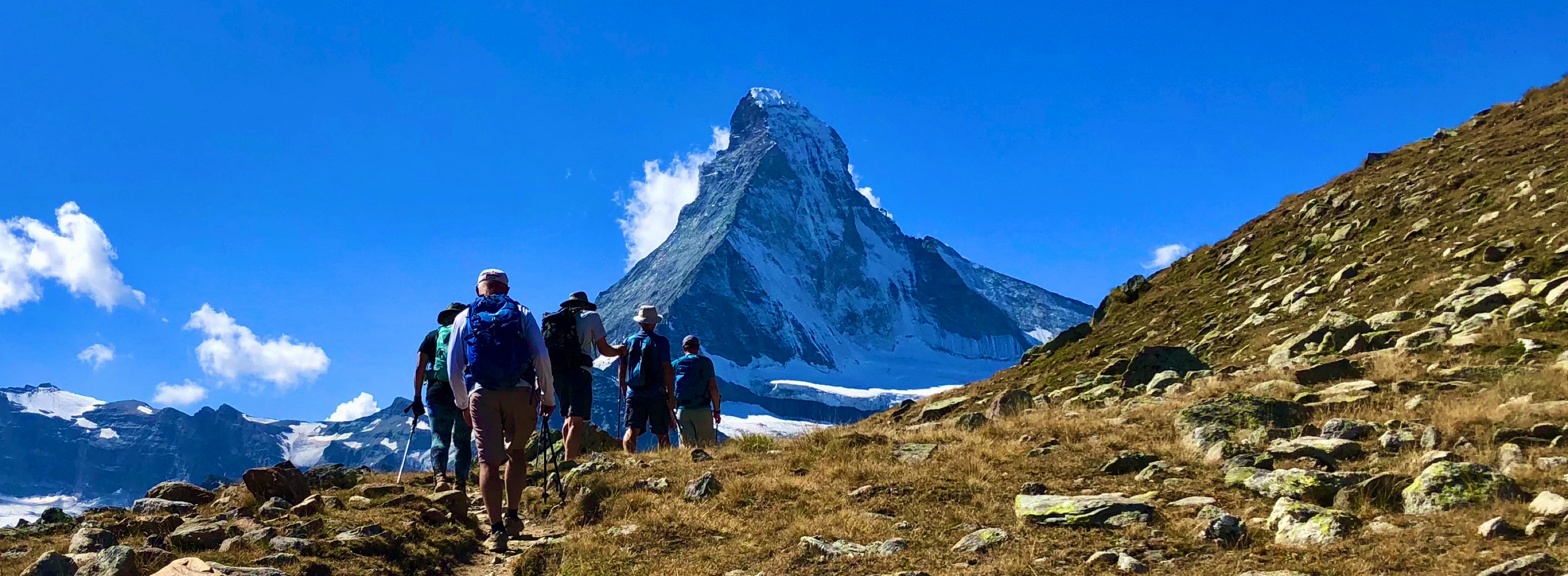 A guided group on the Haute Route approaching the iconic Matterhorn